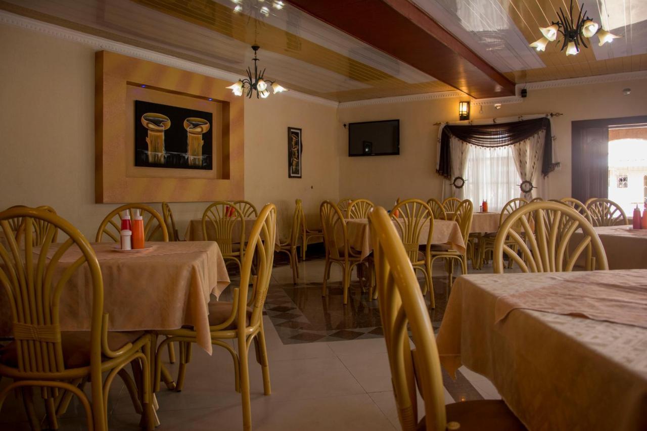 Simba Village Relax Inn เอลโดเร็ท ภายนอก รูปภาพ